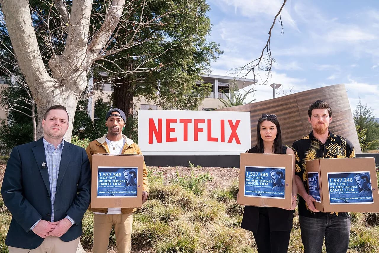 A protest gathering outside Netflix's headquarters in Los Gatos, California, with the hashtag #UnsubscribeNetflix.