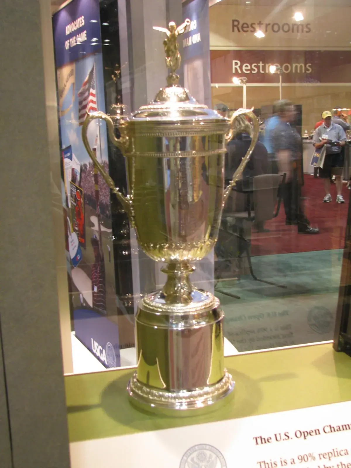 US Open golf championship trophy in a display case