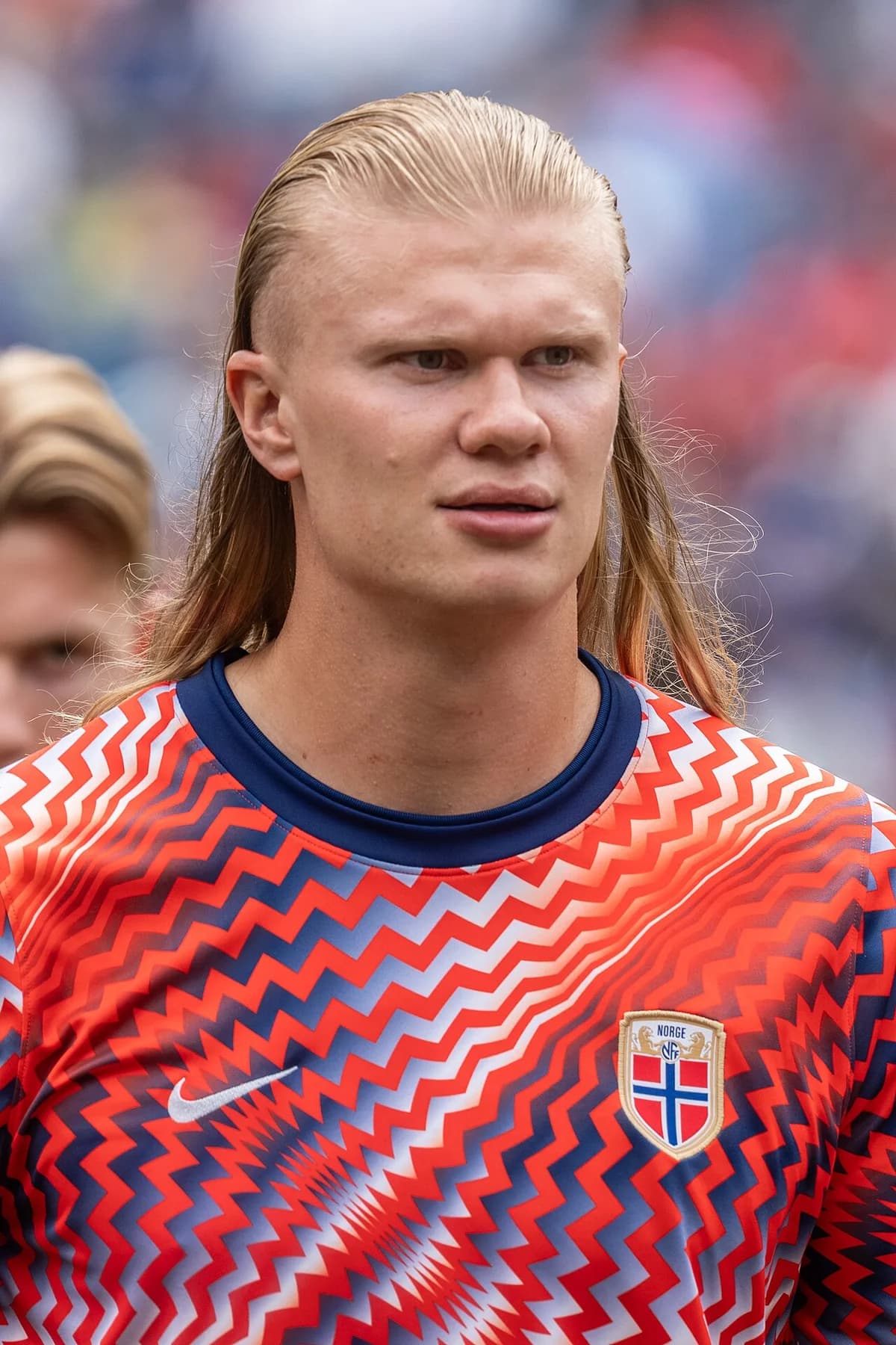Close-up of Erling Haaland wearing a Norway national team jersey.