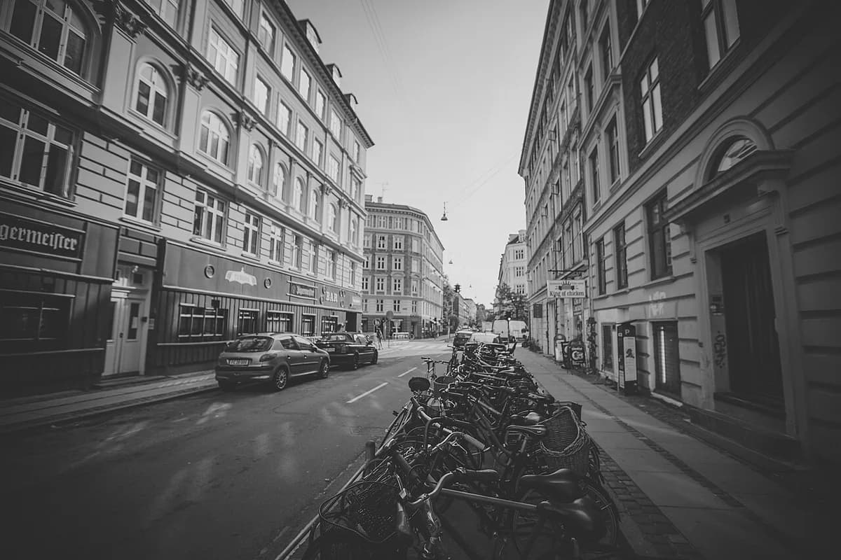 Bicycles parked along a street in Copenhagen.