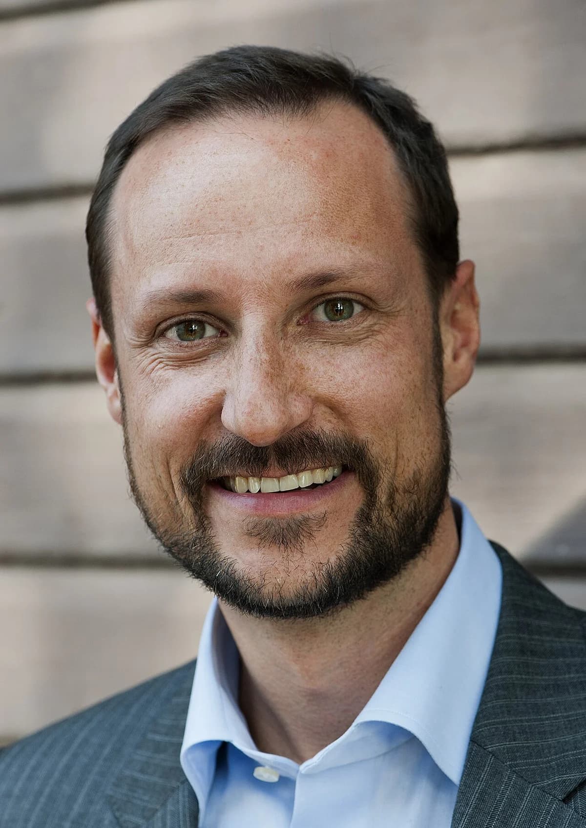 Smiling European man in suit and shirt