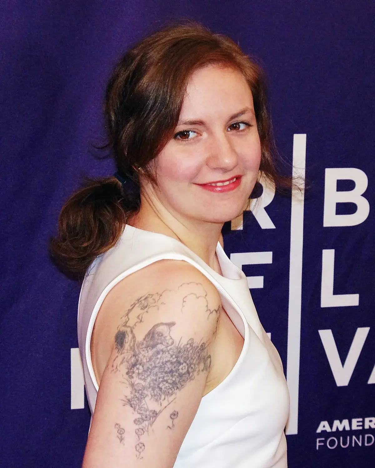 Lena Dunham posing at Tribeca Film Festival 2012.