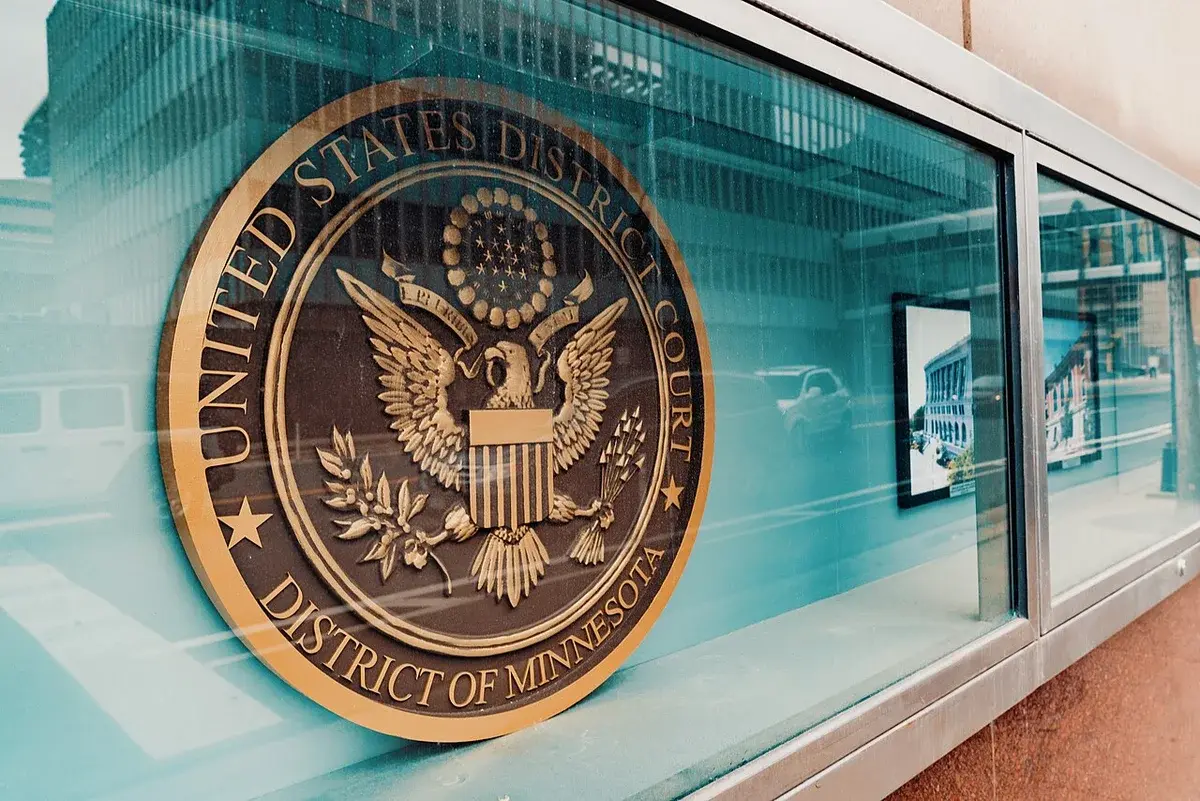 Seal of the United States District Court for the District of Minnesota on a courthouse wall in Minneapolis.