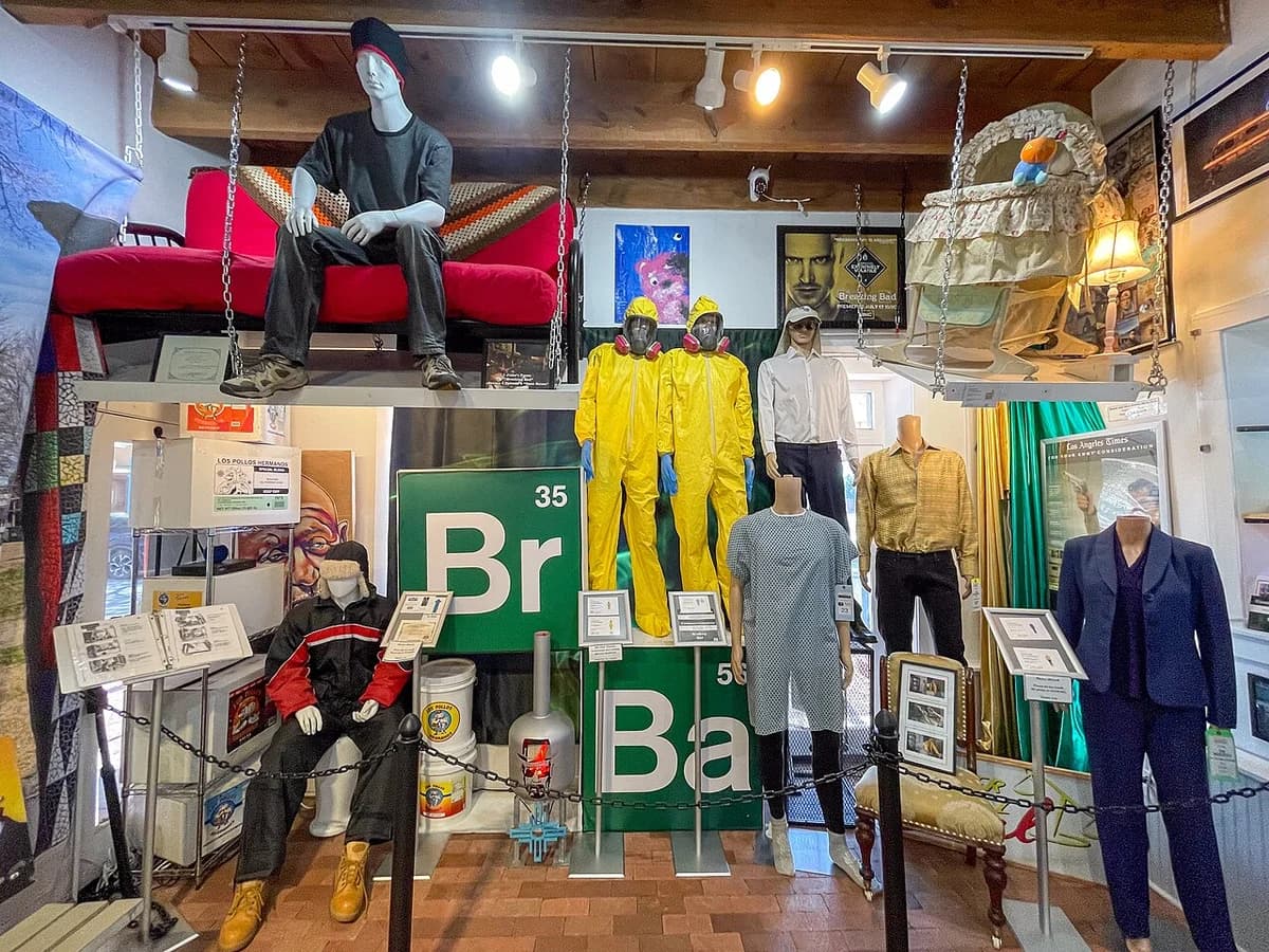 Breaking Bad props and costumes displayed in a shop exhibit.