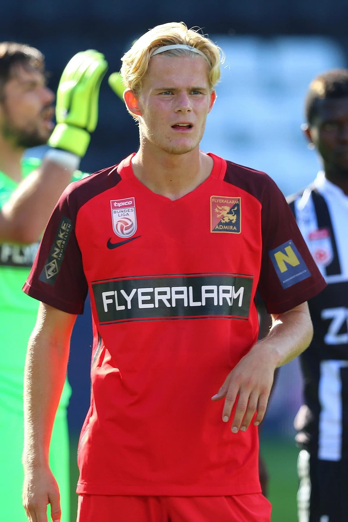 Football player Morten Hjulmand in FC Admira Wacker Mödling red jersey