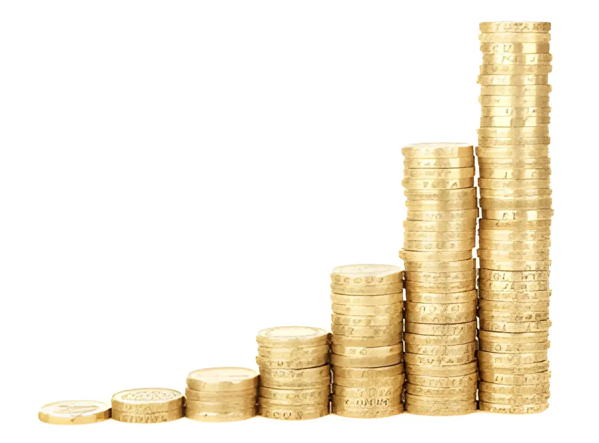 stack of gold coins arranged in increasing height