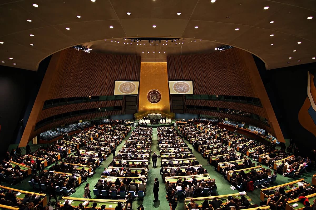 Wide view of the United Nations General Assembly Hall filled with delegates.