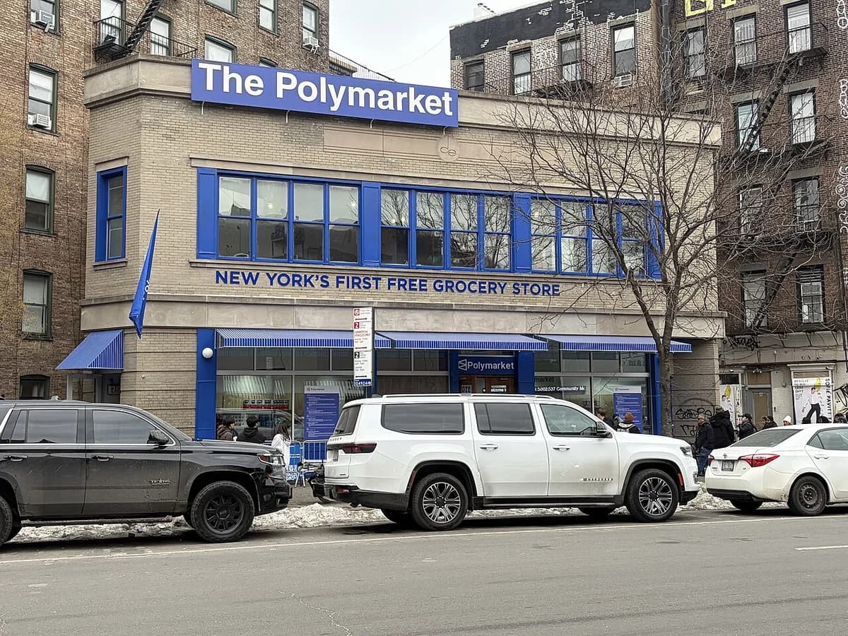 The Polymarket pop-up grocery store storefront in New York City, viewed from across the street.