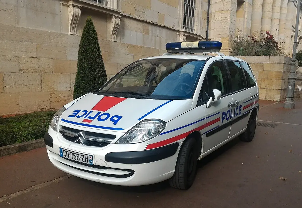 French police Citroën C8 car parked on street
