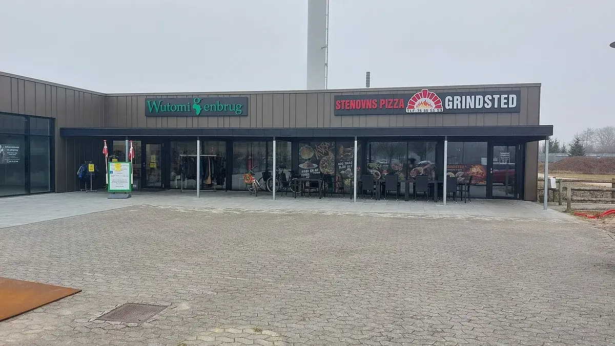 Exterior of Wutomi Genbrug storefront in Grindsted, Denmark.