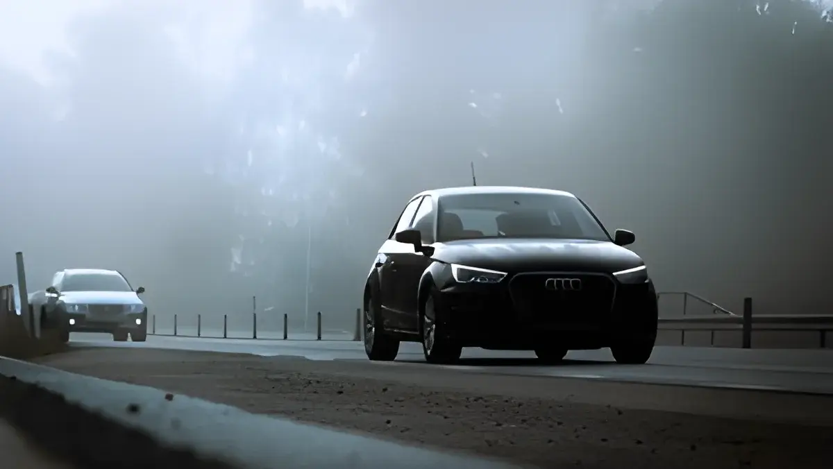 cars driving on a foggy road
