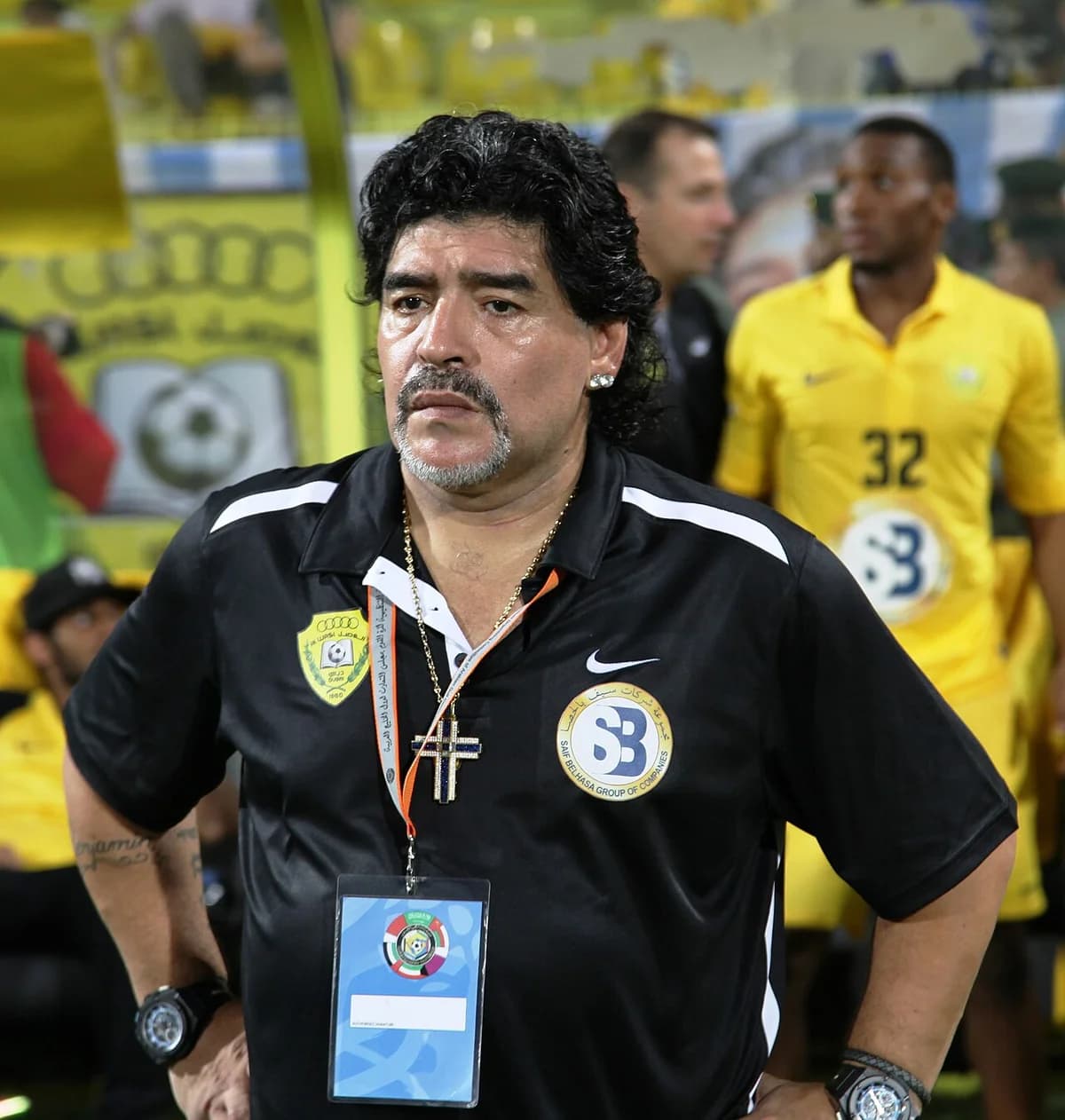 Diego Maradona coaching football match