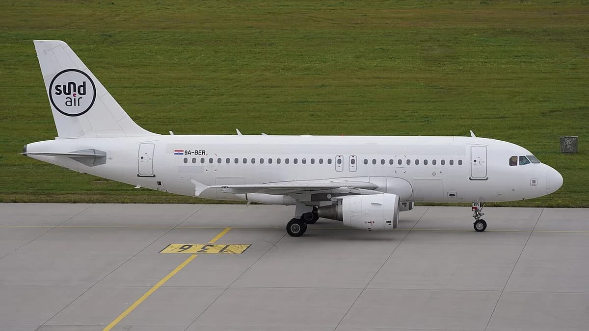 Airbus A319 aircraft of Sund Air taxiing on runway