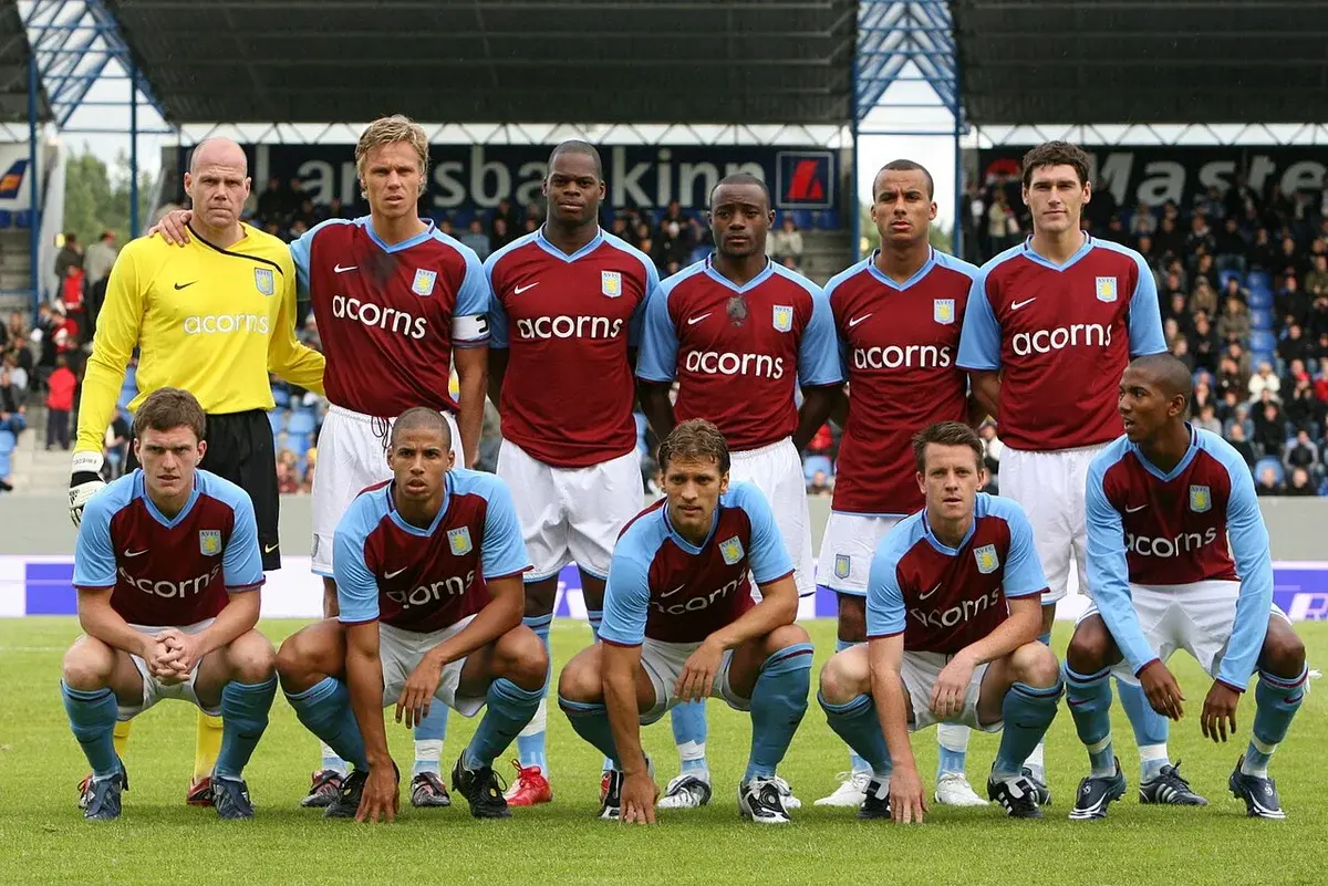 Aston Villa football team posing for a group photo before a match