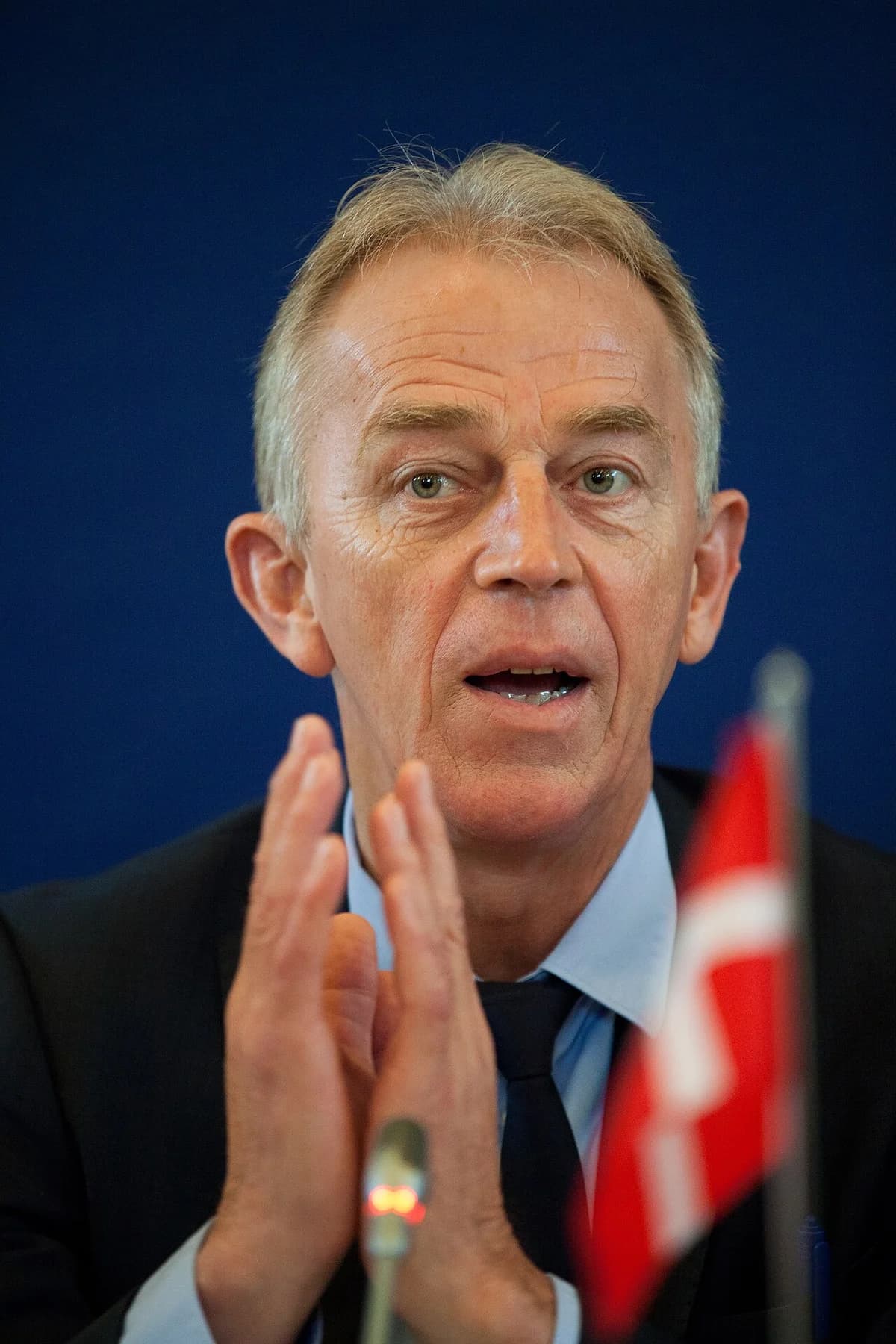 Villy Søvndal speaking at a press conference.