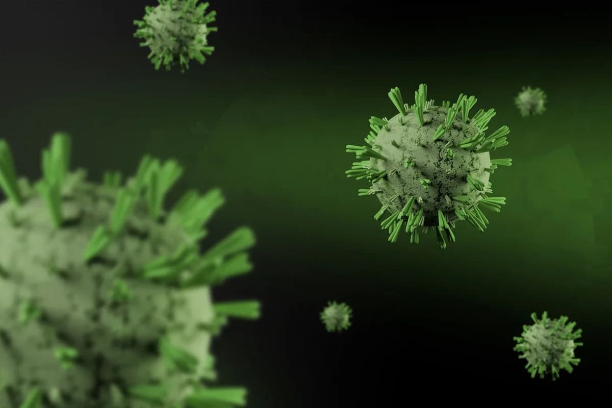 3D-rendered virus particles floating on a dark green background.