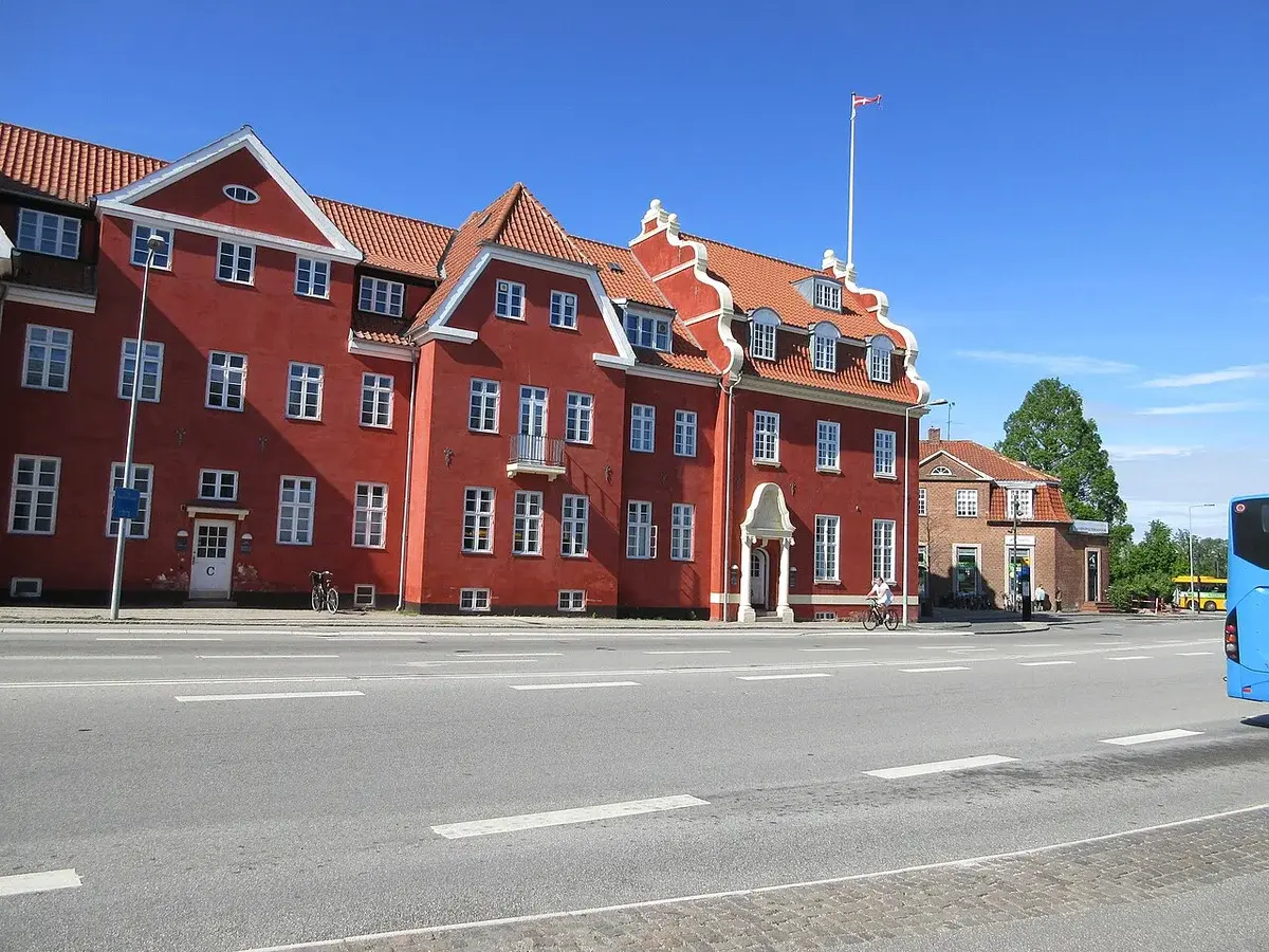 Historic red town hall building in Hørsholm, Denmark.
