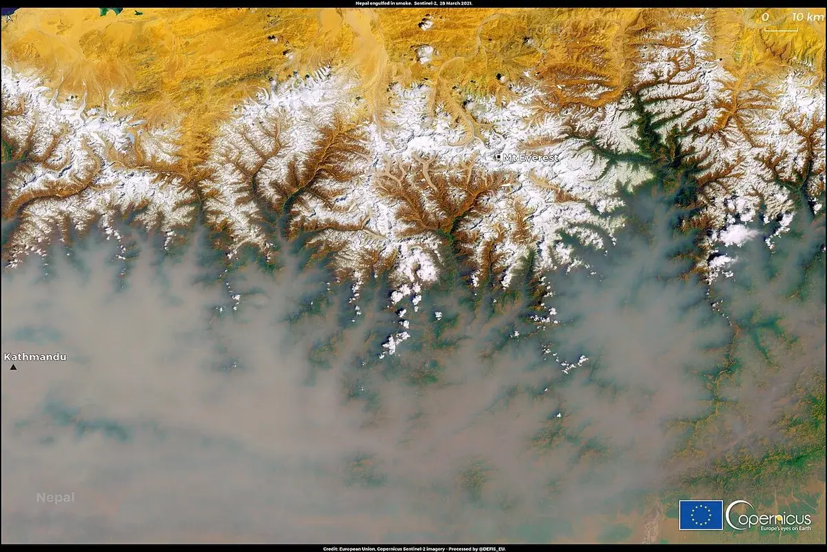 Satellite image of Nepal with smoke covering valleys near Kathmandu and Mt. Everest