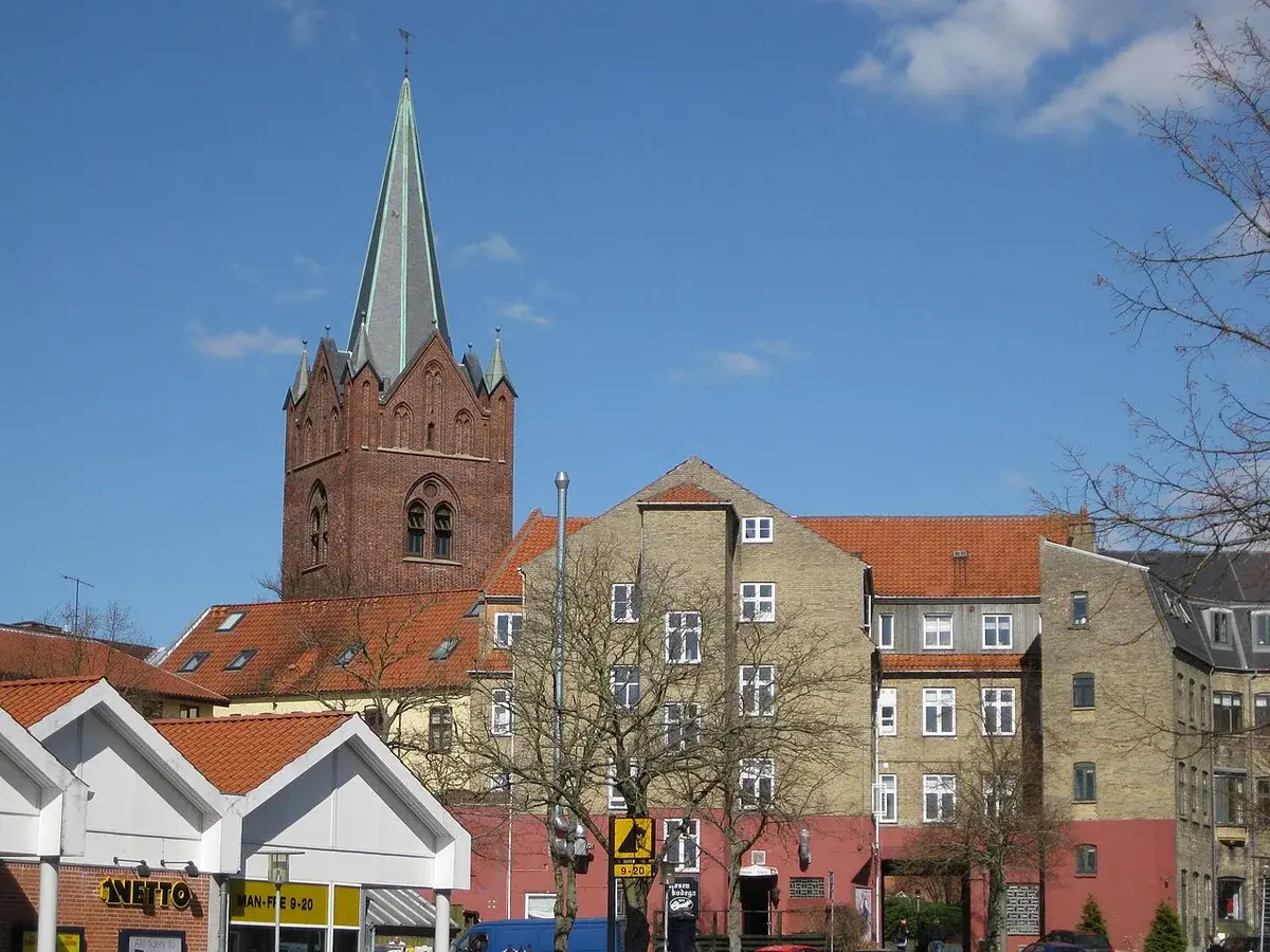 View of buildings and a church spire in Slagelse, Denmark.