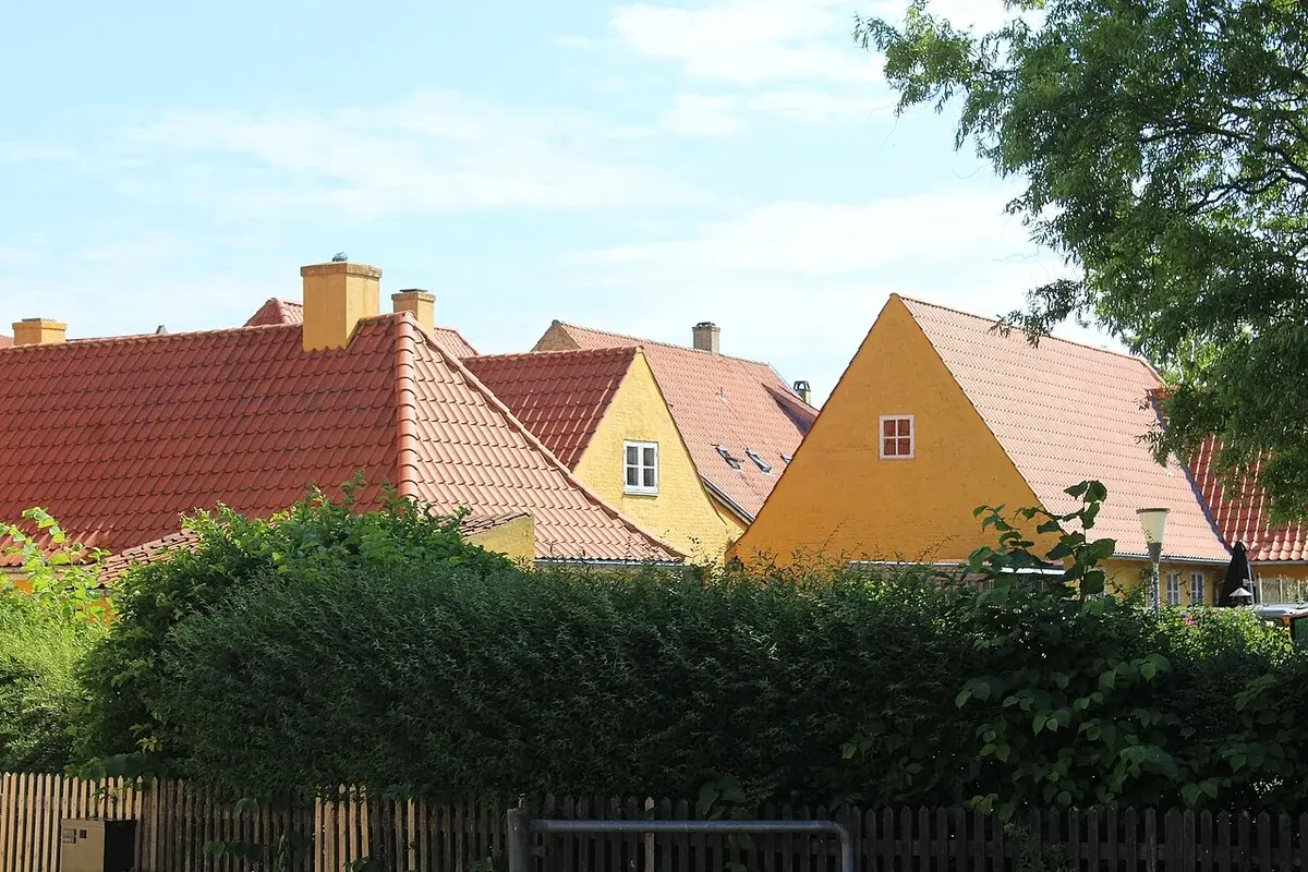 Residential houses with red-tiled roofs in Maribo, Denmark.