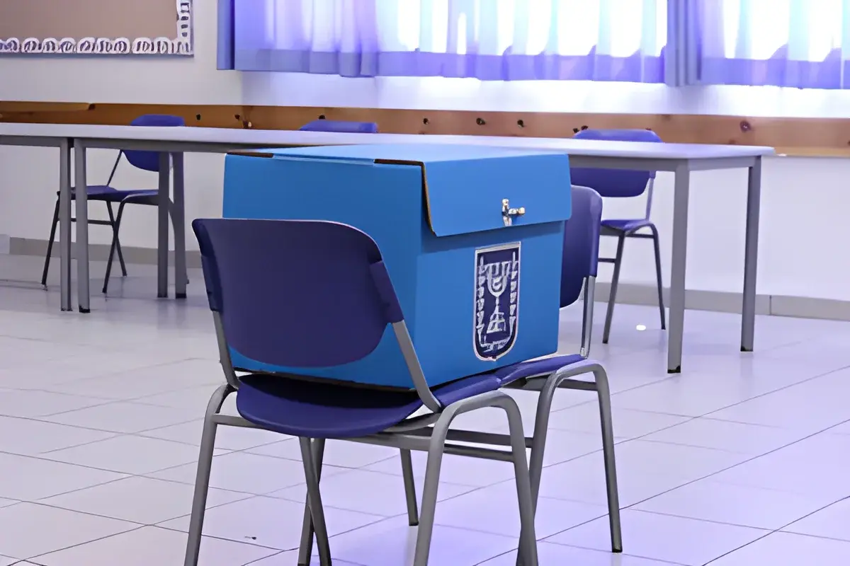 Blue ballot box with Israel emblem in voting room