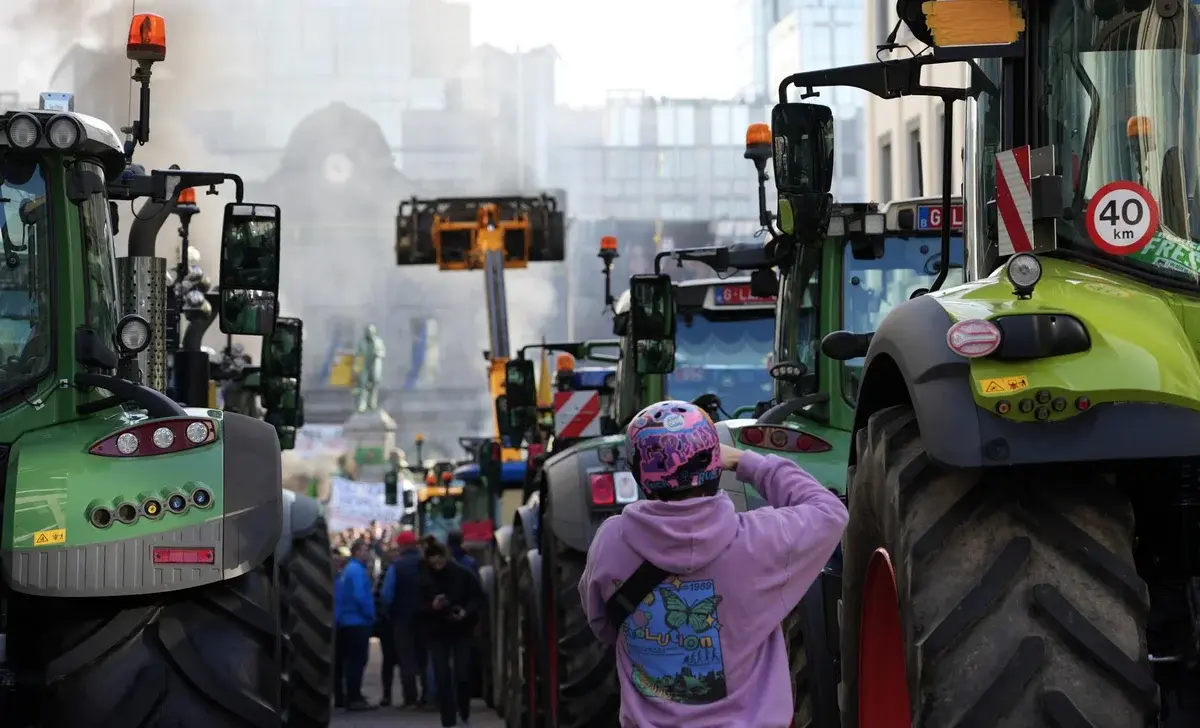 Tractors lined up on a city street during a farmers' protest