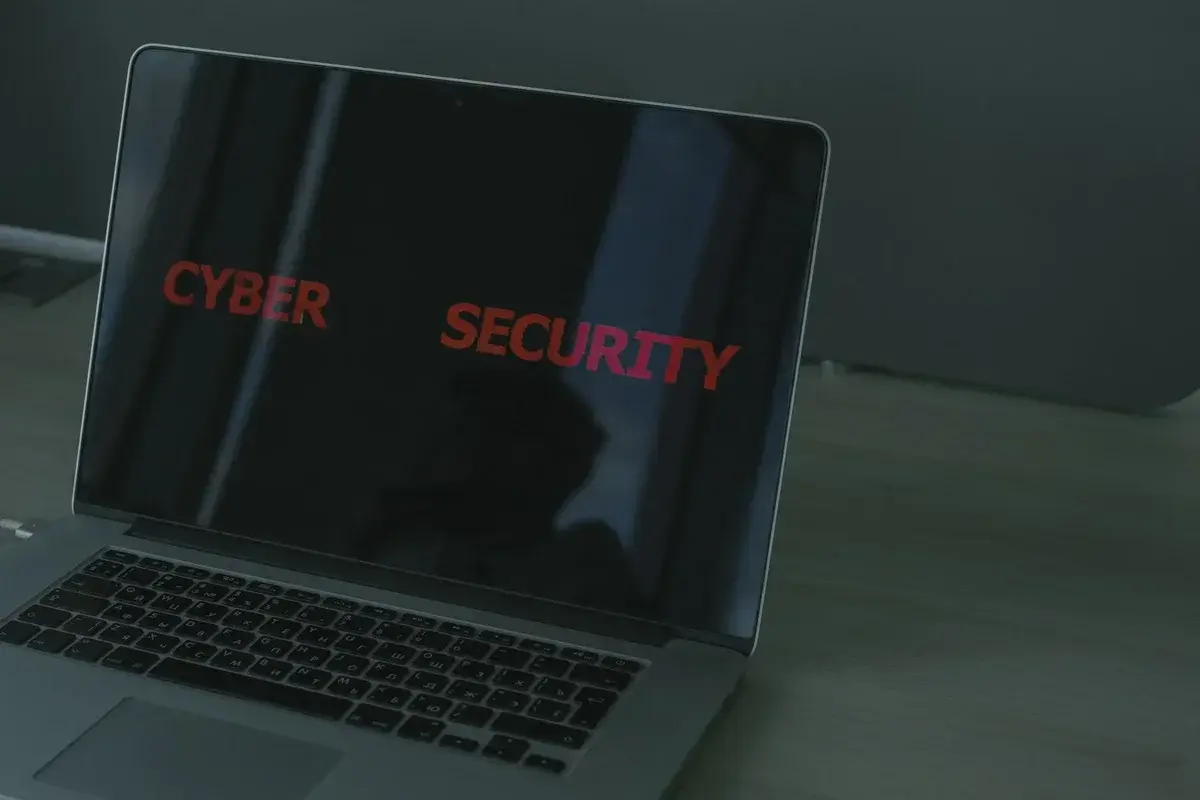 Laptop with 'CYBER SECURITY' text on screen