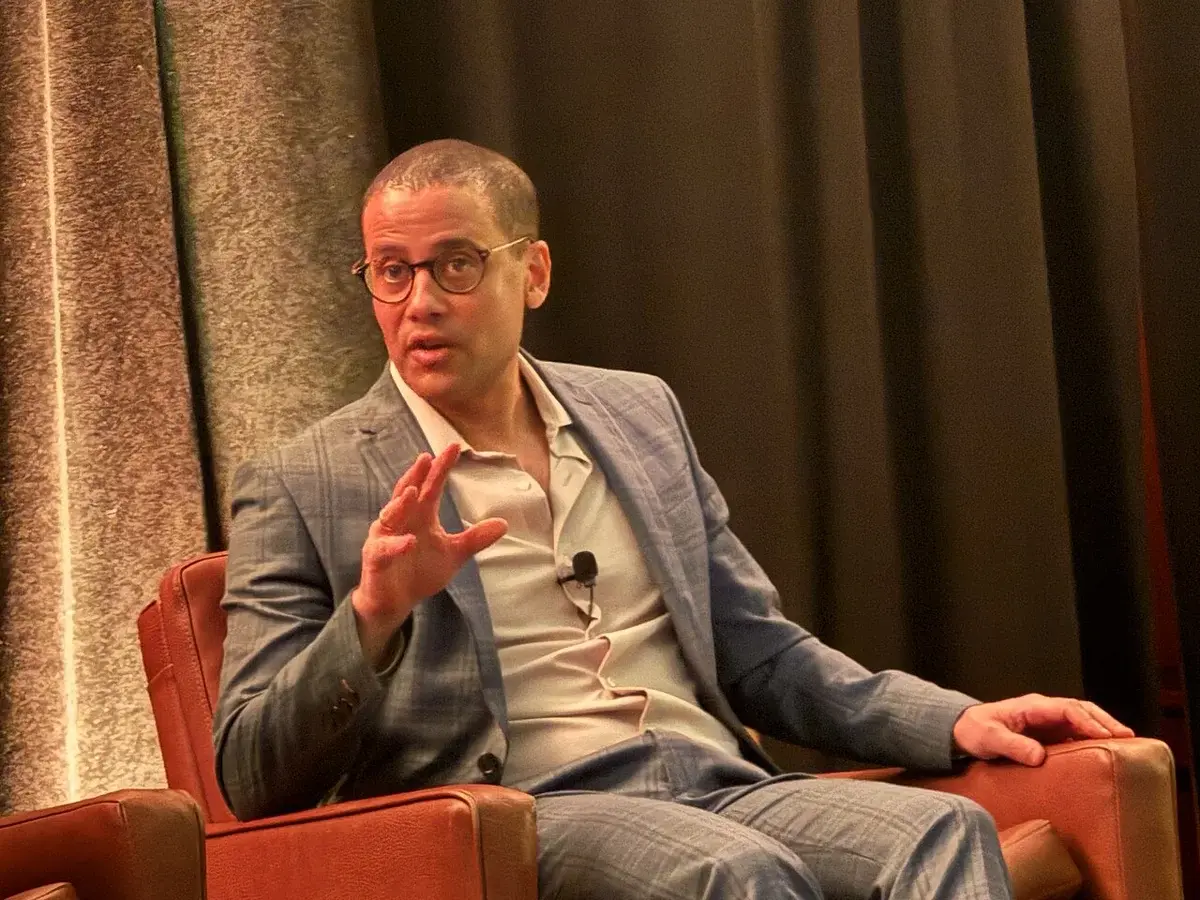 Jacob Mchangama speaking on stage at the Knight Media Forum.