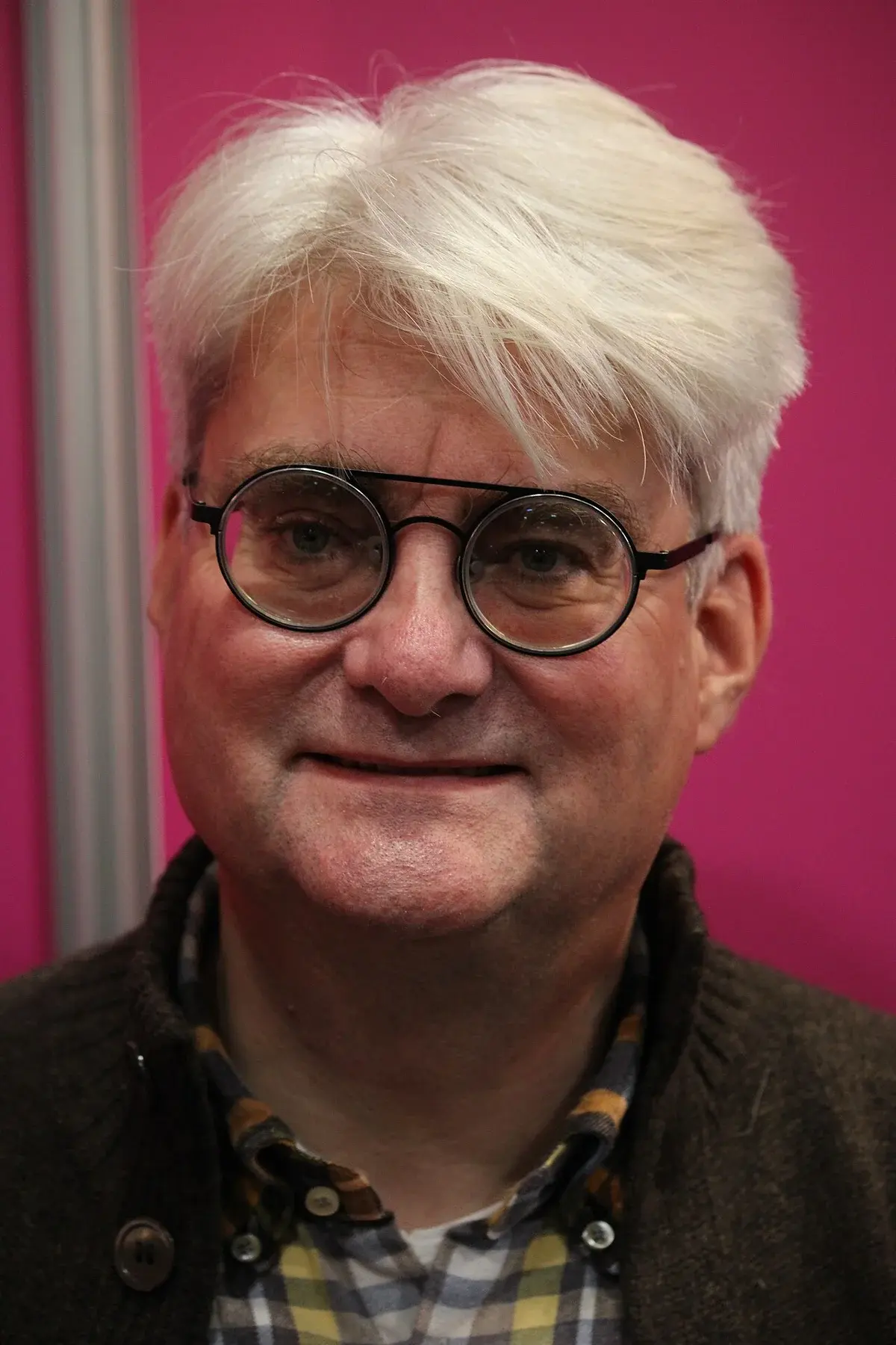 Close-up portrait of Søren Pind at a book conference in Copenhagen.