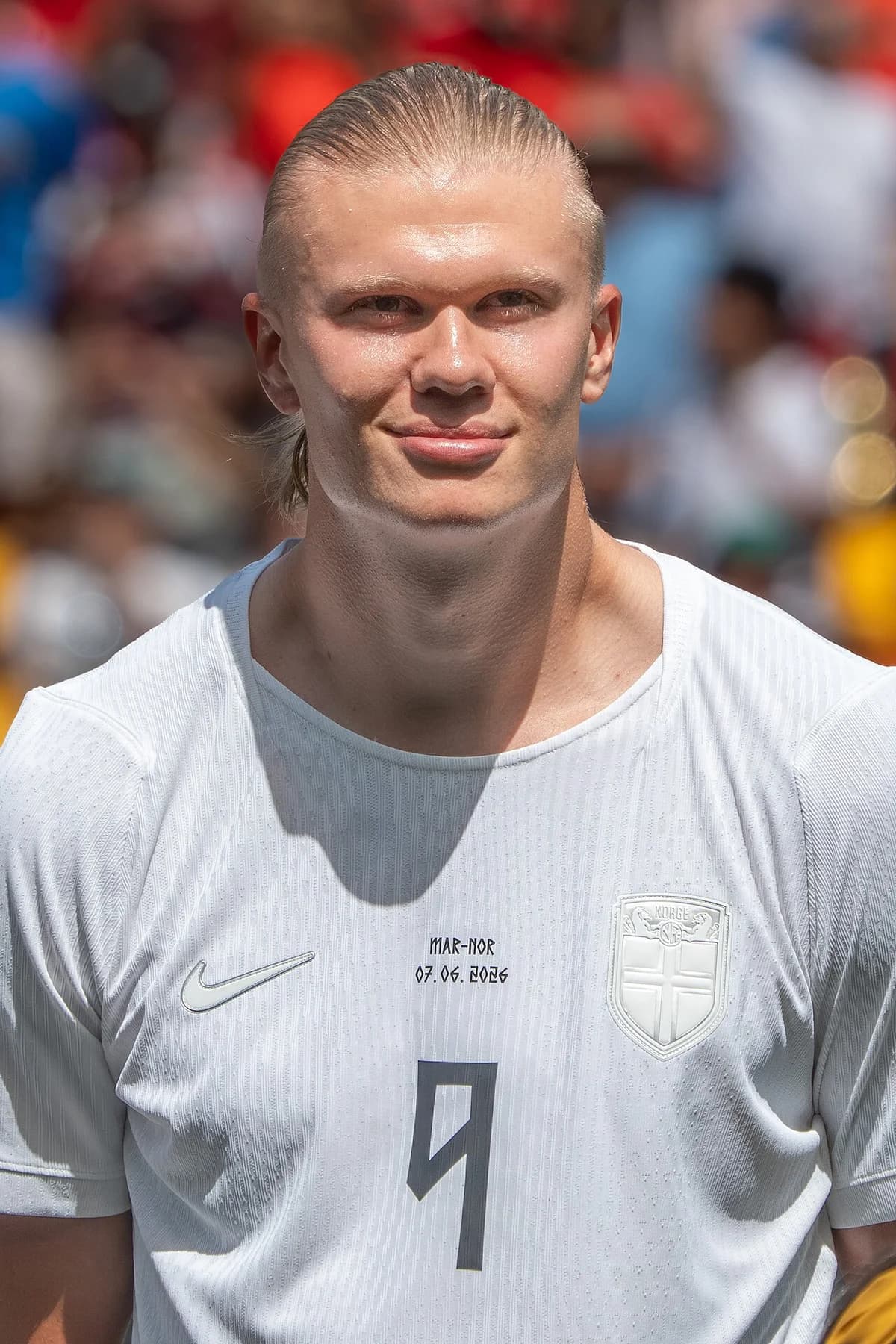 Erling Haaland in a Norway football jersey during a match.