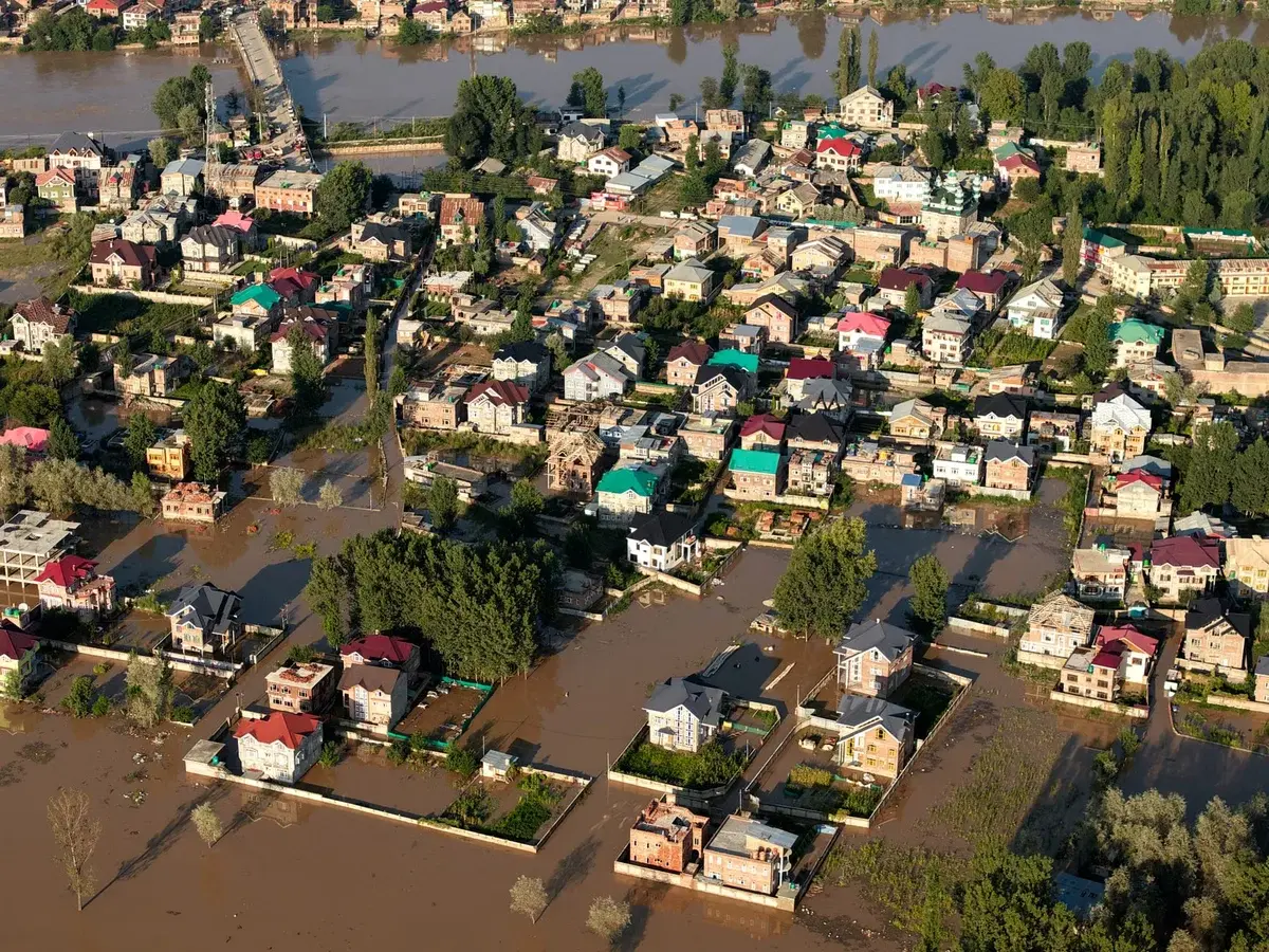 Aerial view of a flooded urban area with submerged streets and houses in Kashmir, India