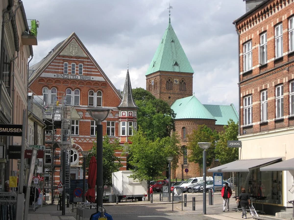Street scene in Ringsted, Denmark, with St. Bendt's Church visible in the background.