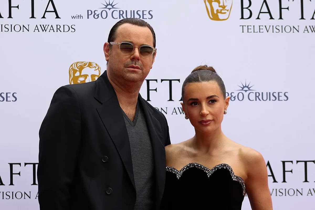 Danny Dyer and Dani Dyer posing on the BAFTA Television Awards red carpet.