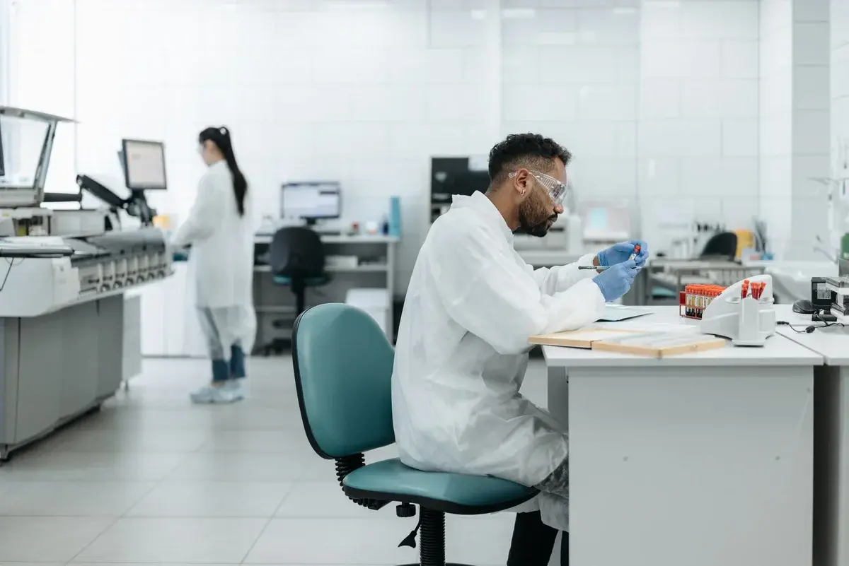 Scientists working with samples in a modern laboratory